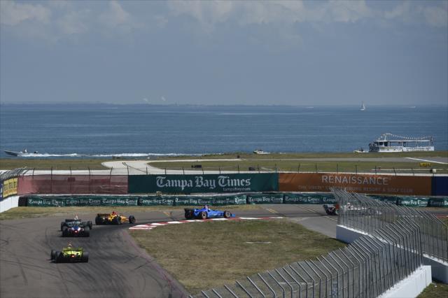 The field streams through Turns 13-14 during the Firestone Grand Prix of St. Petersburg -- Photo by: Chris Owens