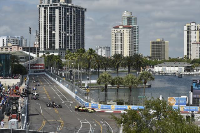 The field streams down the backstretch into Turn 10 during the Firestone Grand Prix of St. Petersburg -- Photo by: Chris Owens