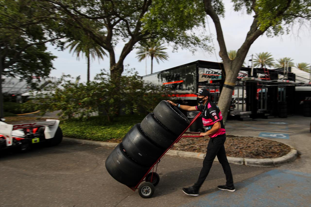 Meyer Shank crew member hauling Firestone tires - Firestone Grand Prix of St. Petersburg -- Photo by: Joe Skibinski