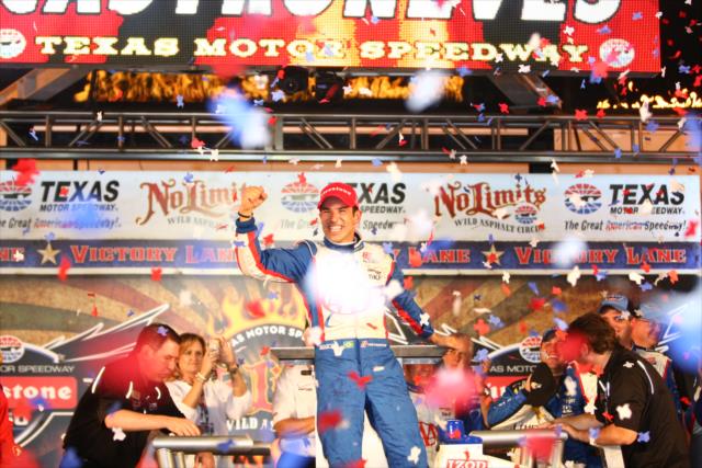 Helio Castroneves celebrates his win in the 2013 Firestone 550 -- Photo by: Chris Jones