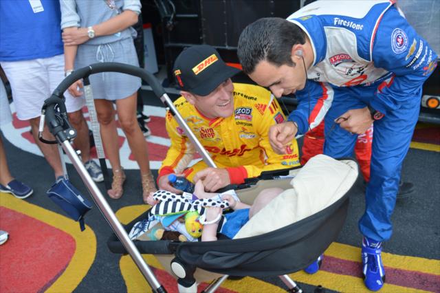 Helio Castroneves and Ryan Hunter-Reay with Ryden Hunter-Reay -- Photo by: John Cote