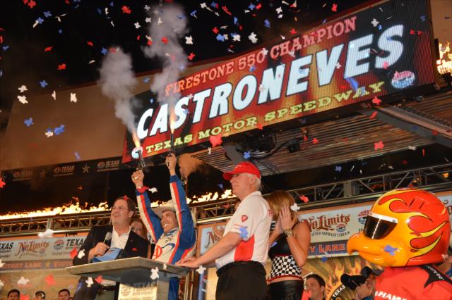 Helio Castroneves fires the celebratory six-shooters at Texas Motor Speedway -- Photo by: John Cote