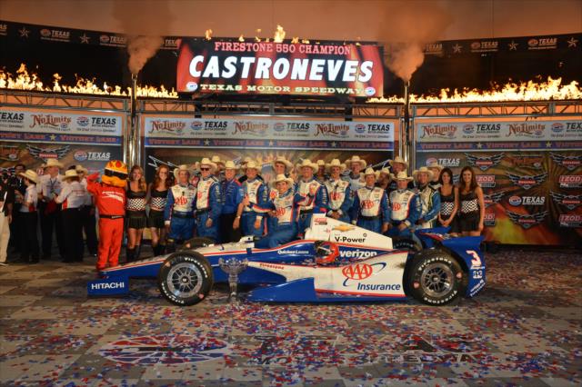Helio Castroneves celebrates in Victory Lane with his team -- Photo by: John Cote
