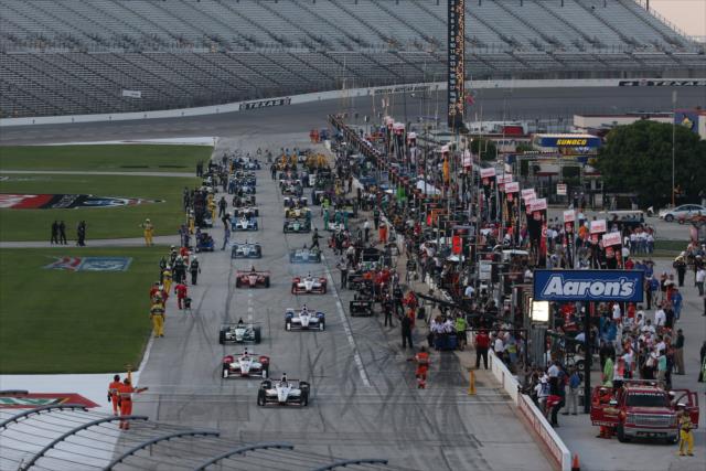The field leaves pit lane for the Firestone 600 at Texas Motor Speedway -- Photo by: Chris Jones