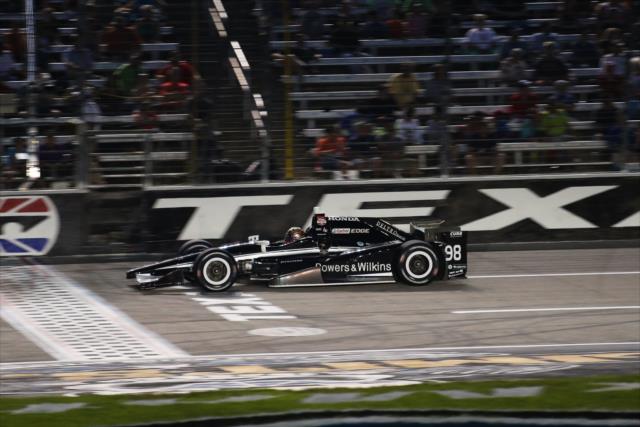 Gabby Chaves flashes across the start/finish line during the Firestone 600 at Texas Motor Speedway -- Photo by: Chris Jones