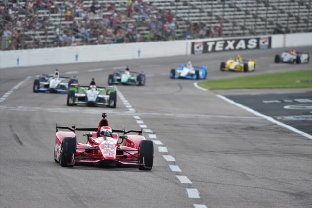 Graham Rahal leads a group into Turn 1 during the Firestone 600 at Texas Motor Speedway -- Photo by: Chris Owens