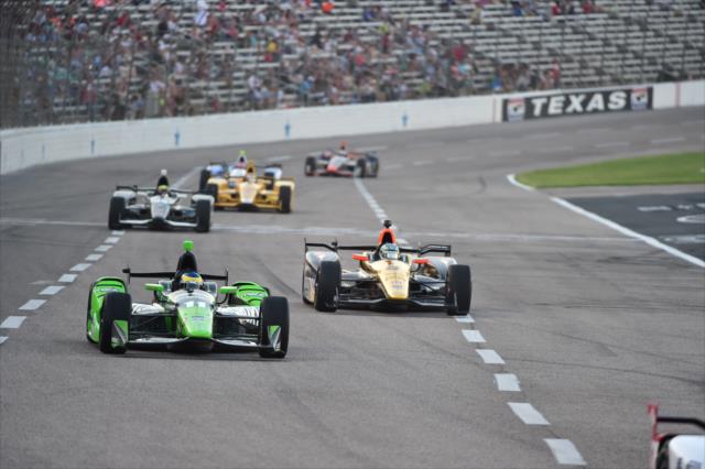 Sebastien Bourdais and Ryan Briscoe set up for Turn 1 during the Firestone 600 at Texas Motor Speedway -- Photo by: Chris Owens