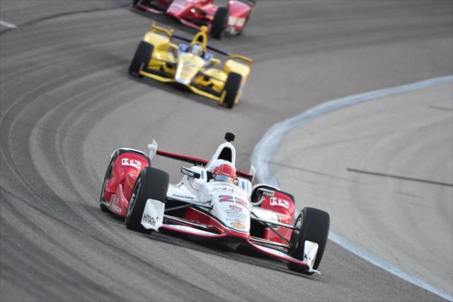Simon Pagenaud leads a group through Turn 2 during the Firestone 600 at Texas Motor Speedway -- Photo by: Chris Owens