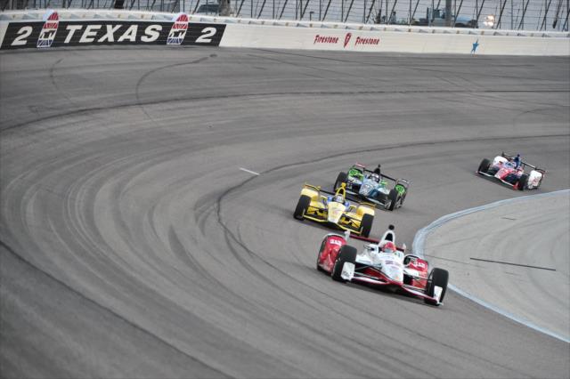 Simon Pagenaud leads a group through Turn 2 during the Firestone 600 at Texas Motor Speedway -- Photo by: Chris Owens