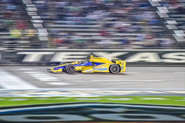 Marco Andretti streaks across the start/finish line during the Firestone 600 at Texas Motor Speedway -- Photo by: Chris Owens