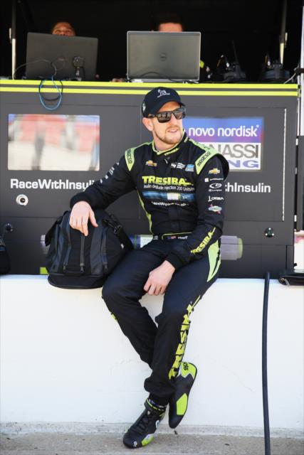Charlie Kimball sits along pit lane prior to practice for the Firestone 600 at Texas Motor Speedway -- Photo by: Chris Jones