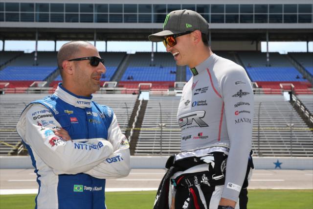 Tony Kanaan and Graham Rahal chat on pit lane prior to qualifications for the Firestone 600 at Texas Motor Speedway -- Photo by: Chris Jones