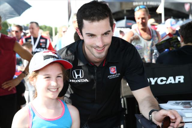 Alexander Rossi poses for a photograph during the autograph session at Texas Motor Speedway -- Photo by: Chris Jones