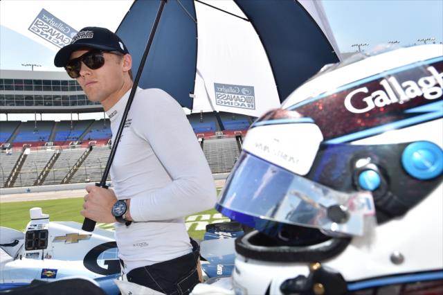 Max Chilton waits along pit lane for his qualification attempt for the Firestone 600 at Texas Motor Speedway -- Photo by: Chris Owens
