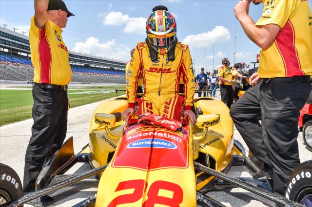 Ryan Hunter-Reay slides into his No. 28 DHL Honda prior to his qualification attempt for the Firestone 600 at Texas Motor Speedway -- Photo by: Chris Owens