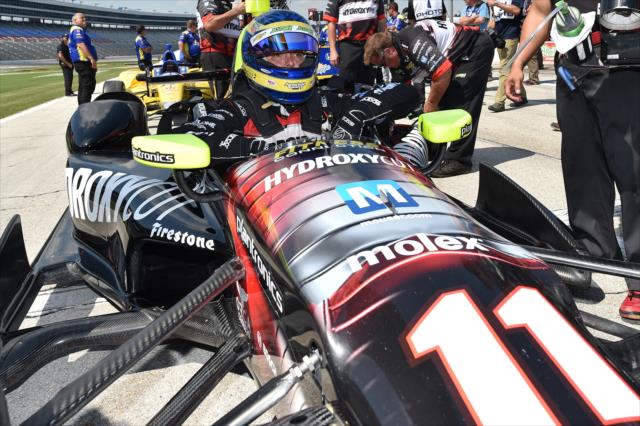 Sebastien Bourdais slides into his No. 11 Hydroxycut Chevrolet prior to his qualification attempt for the Firestone 600 at Texas Motor Speedway -- Photo by: Chris Owens