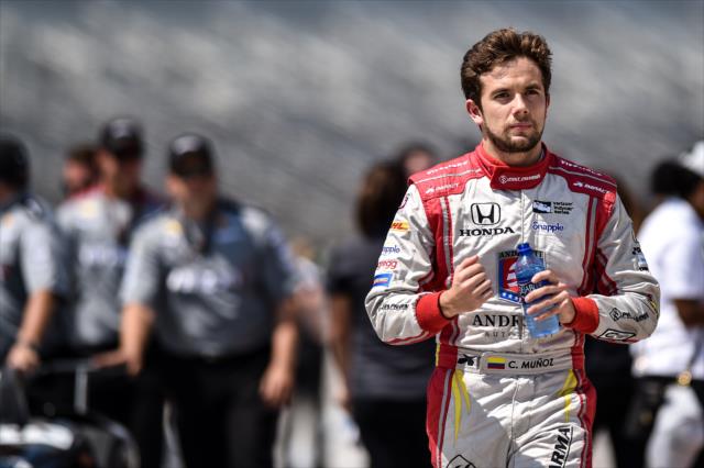 Carlos Munoz walks pit lane prior to his qualification attempt for the Firestone 600 at Texas Motor Speedway -- Photo by: Chris Owens