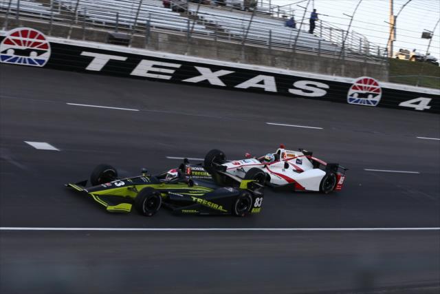 Charlie Kimball and Tristan Vautier sail through Turn 4 during the Rainguard Water Sealers 600 at Texas Motor Speedway -- Photo by: Chris Jones