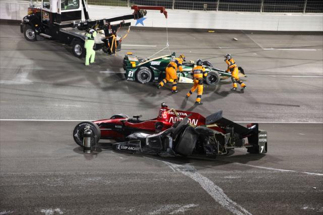 The Holmatro Safety Team begin the cleanup from a mid-race incident involving JR Hildebrand and Mikhail Aleshin during the Rainguard Water Sealers 600 at Texas Motor Speedway -- Photo by: Chris Jones