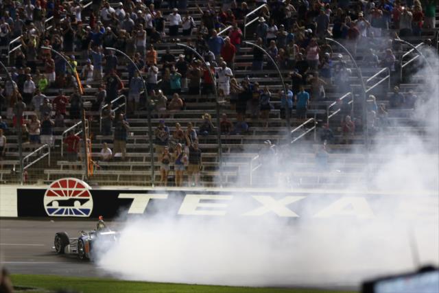 Will Power celebrates with some smoky donuts after winning the Rainguard Water Sealers 600 at Texas Motor Speedway -- Photo by: Chris Jones