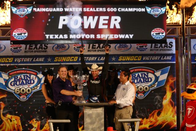 Will Power firest the six-shooters in Victory Circle after winning the Rainguard Water Sealers 600 at Texas Motor Speedway -- Photo by: Chris Jones