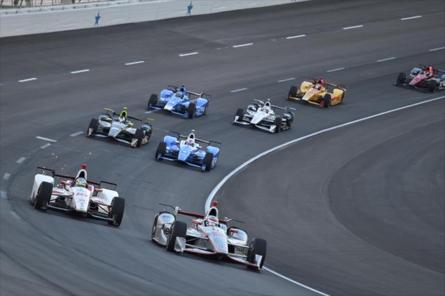 Will Power and Tristan Vautier go side-by-side into Turn 1 during the Rainguard Water Sealers 600 at Texas Motor Speedway -- Photo by: Chris Owens