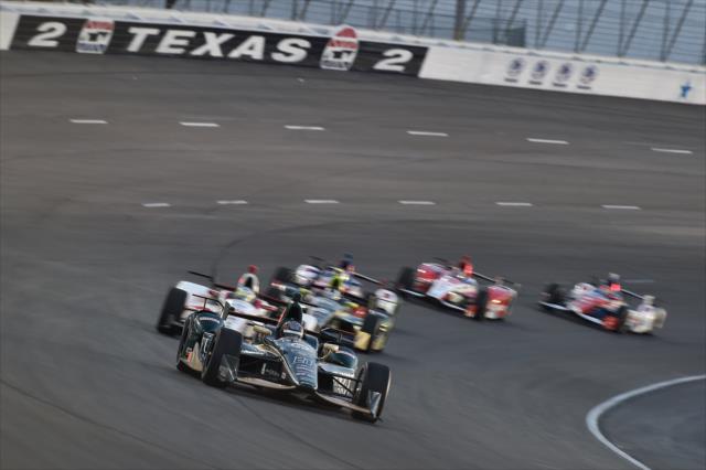 JR Hildebrand leads a group out of Turn 2 during the Rainguard Water Sealers 600 at Texas Motor Speedway -- Photo by: Chris Owens