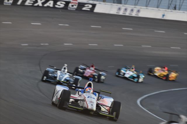 Ed Jones leads a group through Turn 2 during the Rainguard Water Sealers 600 at Texas Motor Speedway -- Photo by: Chris Owens