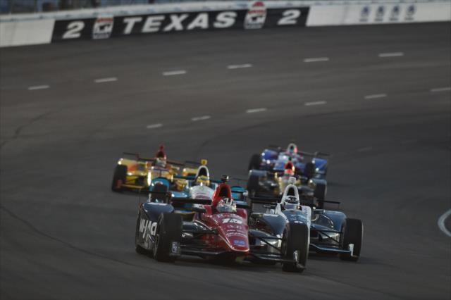 Graham Rahal leads a group out of Turn 2 during the Rainguard Water Sealers 600 at Texas Motor Speedway -- Photo by: Chris Owens