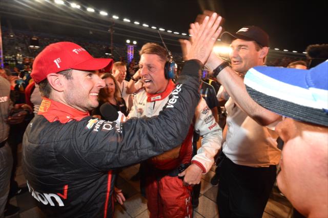 Will Power gets a high-five from Team President Tim Cindric after winning the Rainguard Water Sealers 600 at Texas Motor Speedway -- Photo by: Chris Owens