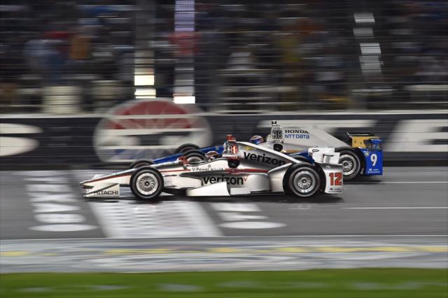 Will Power and Scott Dixon go wheel-to-wheel across the start-finish line during the Rainguard Water Sealers 600 at Texas Motor Speedway -- Photo by: Chris Owens