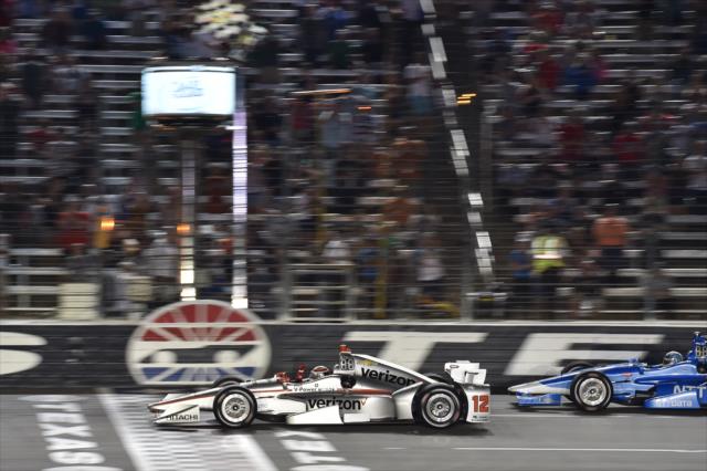 Will Power takes the twin checkers to win the Rainguard Water Sealers 600 at Texas Motor Speedway -- Photo by: Chris Owens