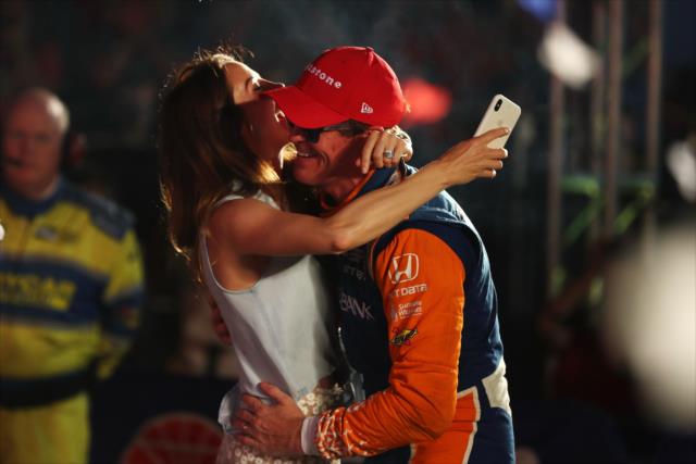 Scott Dixon with a congratulatory hug from his wife, Emma, in Victory Lane after winning the DXC Technology 600 at Texas Motor Speedway -- Photo by: Chris Jones