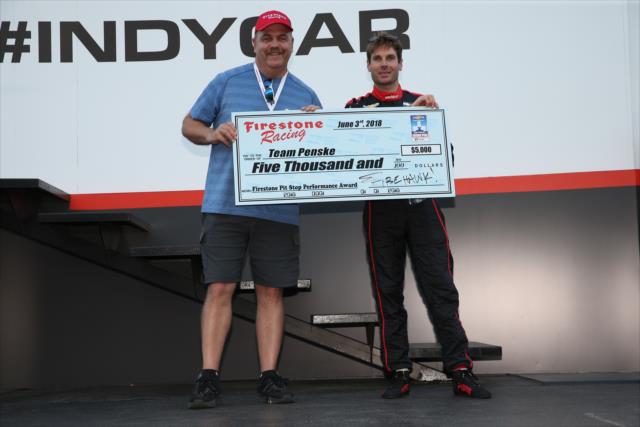 Will Power accepts the Firestone Pit Stop Performance Award on behalf of Team Penske for their performance in Detroit -- Photo by: Chris Jones