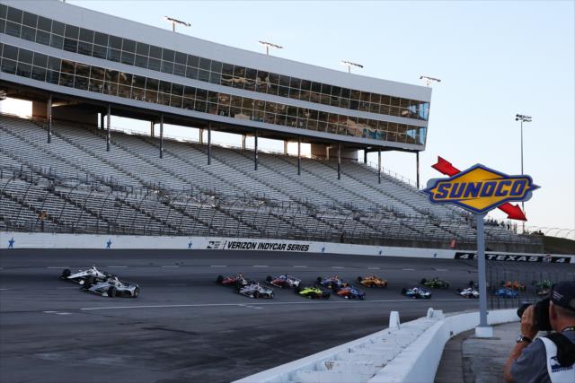 Josef Newgarden and Simon Pagenaud lead the field to the green flag to start the DXC Technology 600 at Texas Motor Speedway -- Photo by: Chris Jones