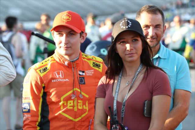 Zach Veach and his girlfriend, Kate, on the grid during pre-race festivities for the DXC Technology 600 at Texas Motor Speedway -- Photo by: Chris Jones