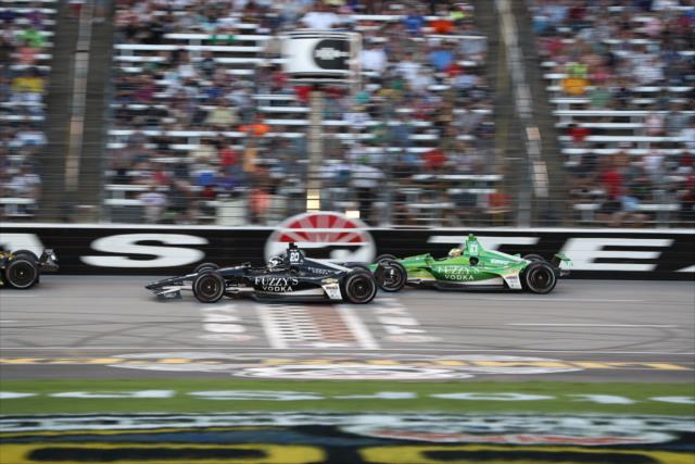 Teammates Ed Carpenter and Spencer Pigot streak across the start-finish line during the DXC Technology 600 at Texas Motor Speedway -- Photo by: Chris Jones
