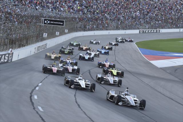 Josef Newgarden leads the field into Turn 1 during the start of the DXC Technology 600 at Texas Motor Speedway -- Photo by: Chris Owens