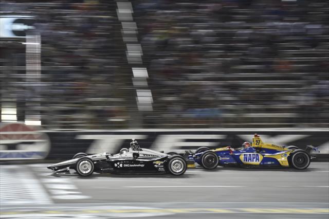 Simon Pagenaud and Alexander Rossi duel across the start-finish line during the DXC Technology 600 at Texas Motor Speedway -- Photo by: Chris Owens