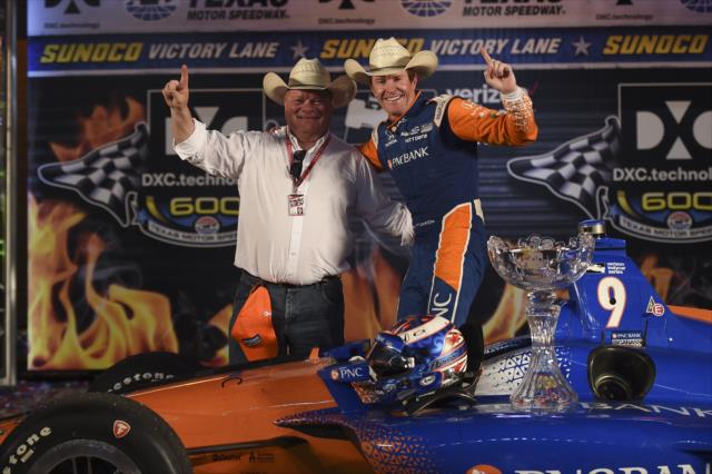 Scott Dixon and team owner Chip Ganassi celebrate in Victory Lane after winning the DXC Technology 600 at Texas Motor Speedway -- Photo by: Chris Owens