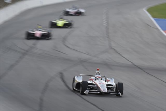 Will Power leads a group into Turn 1 during the DXC Technology 600 at Texas Motor Speedway -- Photo by: Chris Owens