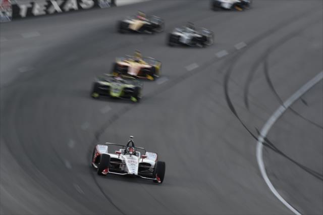 Marco Andretti leads a group into Turn 1 during the DXC Technology 600 at Texas Motor Speedway -- Photo by: Chris Owens