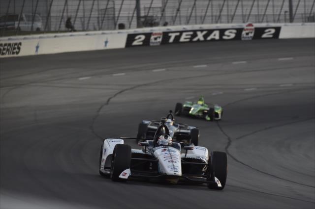Graham Rahal leads a group out of Turn 2 during the DXC Technology 600 at Texas Motor Speedway -- Photo by: Chris Owens