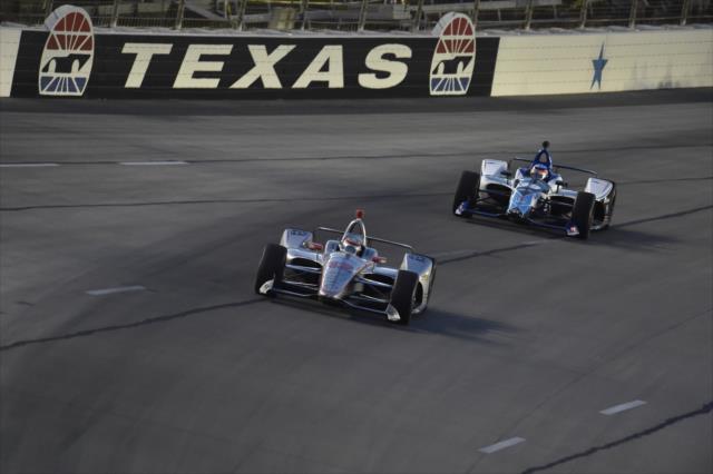 Will Power and Takuma Sato dive into Turn 1 during the DXC Technology 600 at Texas Motor Speedway -- Photo by: Chris Owens