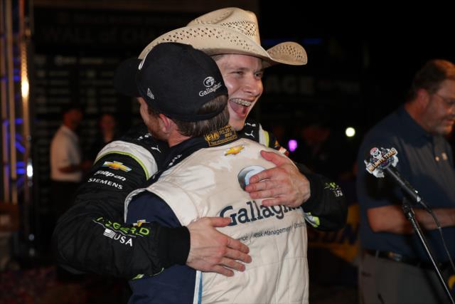 Josef Newgarden celebrates in Victory Circle with Conor Daly after winning the DXC Technology 600 at Texas Motor Speedway -- Photo by: Chris Jones
