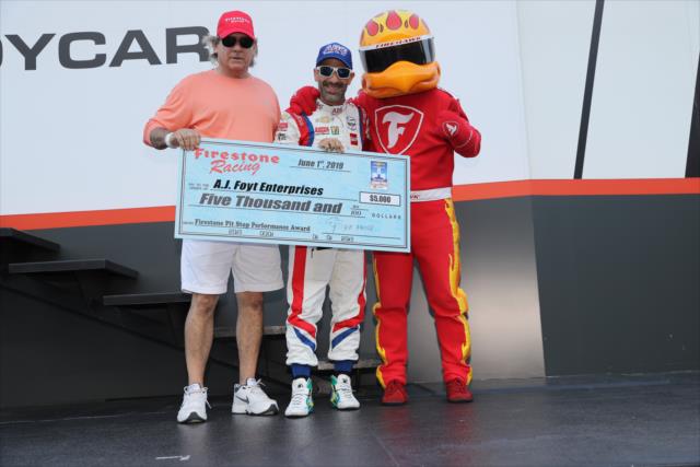 Tony Kanaan receives the Firestone Pit Stop Performance Award from Detroit Race 1 during pre-race ceremonies for the DXC Technology 600 at Texas Motor Speedway -- Photo by: Chris Jones