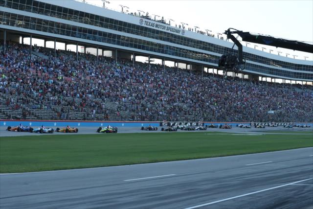 Takuma Sato and Scott Dixon lead a pack of cars to the green flag of the DXC Technology 600 at Texas Motor Speedway -- Photo by: Chris Jones