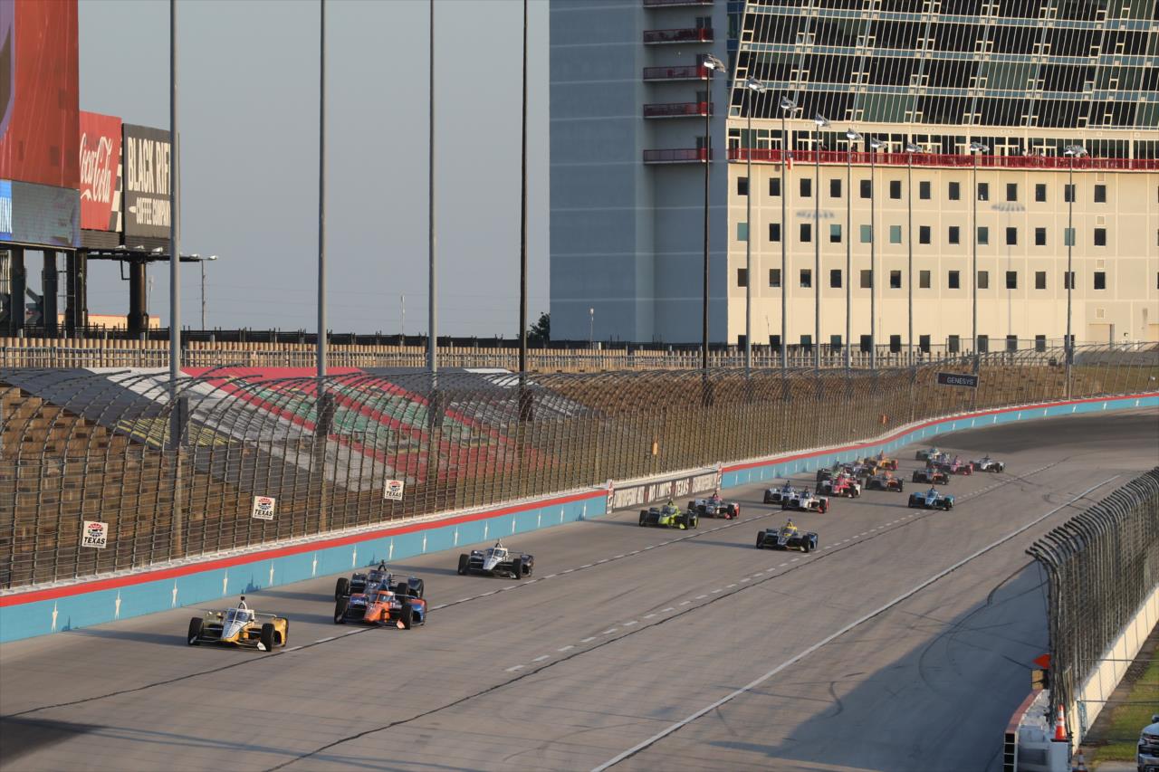A pack of cars runs down the backstretch during the Genesys 300 at Texas Motor Speedway Saturday, June 6, 2020 -- Photo by: Chris Owens