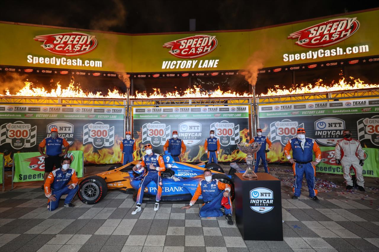 Scott Dixon celebrates with his socially distanced team after winning the Genesys 300 at Texas Motor Speedway Saturday, June 6, 2020 -- Photo by: Chris Owens