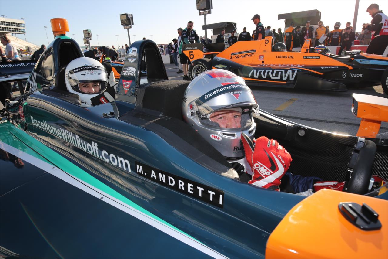 Ashley Reyes riding in the Ruoff Fastest Seat in Sports with Mario Andretti - XPEL 375 - By: Joe Skibinski -- Photo by: Joe Skibinski